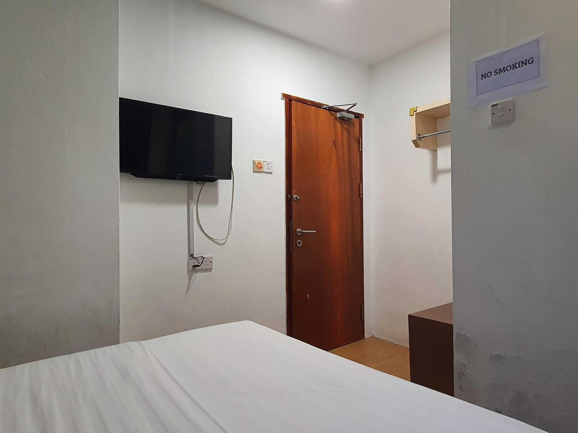 Oyo 91053 Signature Inn Мірі Екстер'єр фото